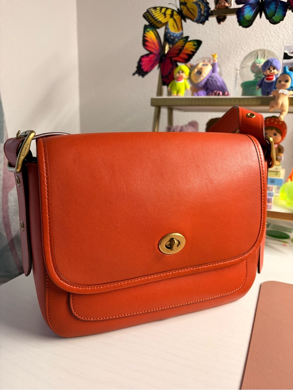 Coach rambler in Mango crossbody